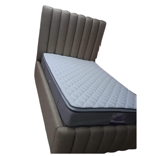 The 'Siena' Channel Tufted Bed